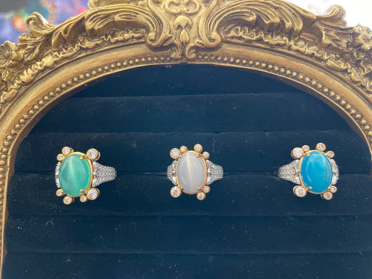 Sterling Silver Ring with Cat Eye Stone Embellished with Zircon in a gold-plated frame D183